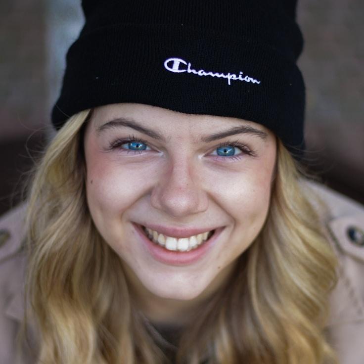 Kaveri Mehta, Lead Design Curator at MillForgeField, reviewing corporate floral arrangements